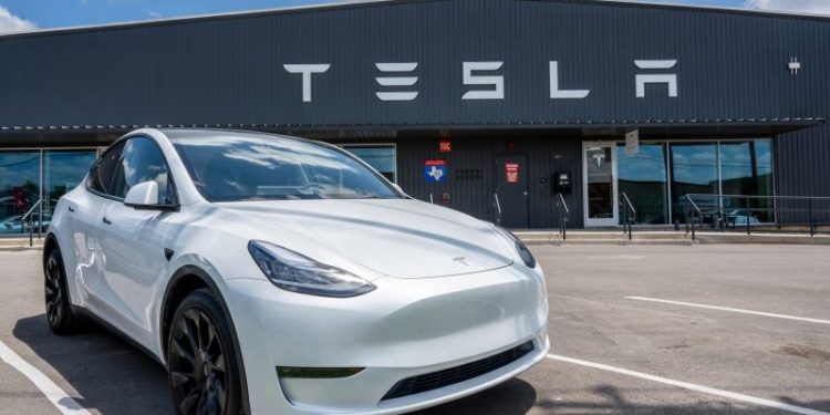 Tesla sees record global deliveries after lowering prices and tapping into EV tax credits