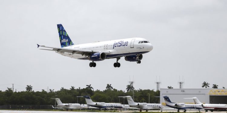 JetBlue says it will end passenger-sharing agreement with American Airlines to focus on buying Spirit