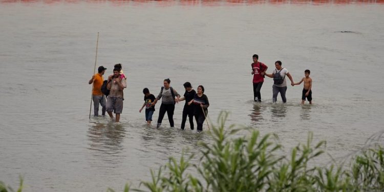 Justice Department sues Texas over floating barrier on the Rio Grande