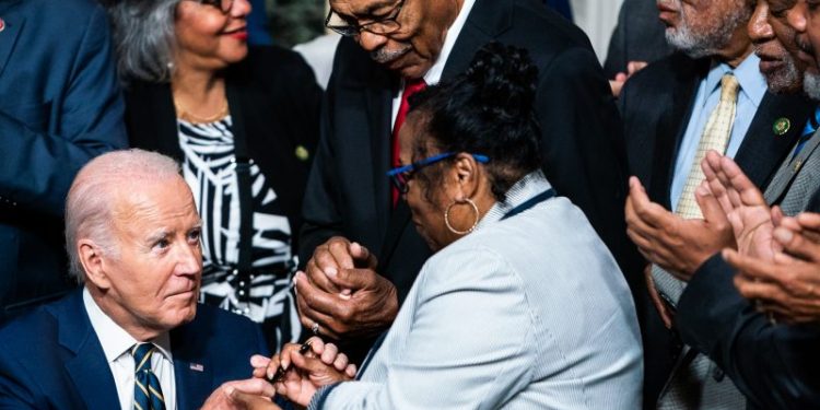 In fight to lead America’s future, battle rages over its racial past