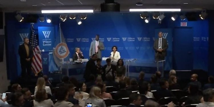 Angry climate change protestors force Commerce Secretary Gina Raimondo to flee talk at the Wilson Center