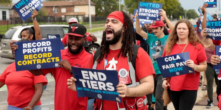 UAW workers overwhelmingly vote to authorize strikes at GM, Ford, Stellantis