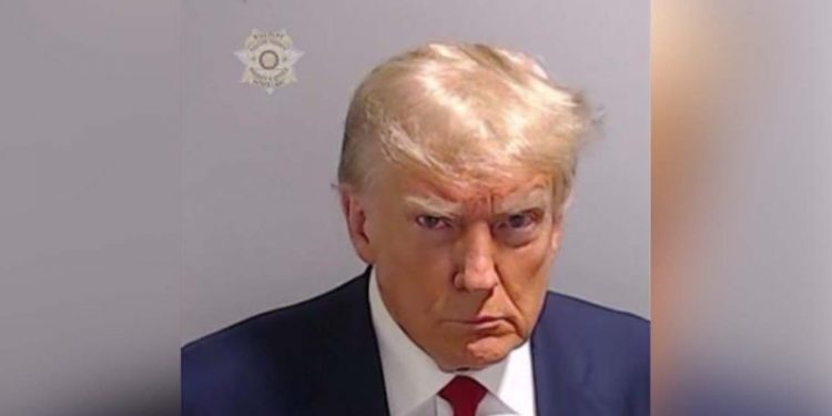 Biden calls Trump a ‘handsome guy’ after he saw former president’s mugshot on TV