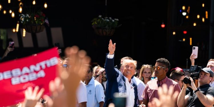 Trump swoops into Iowa fair, defying customs and clashing with DeSantis