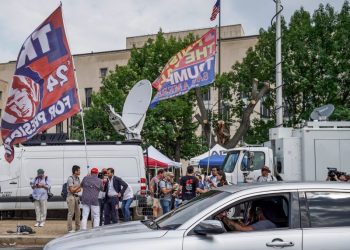 Outside of Trump’s arraignment, revelers mark dueling visions of justice