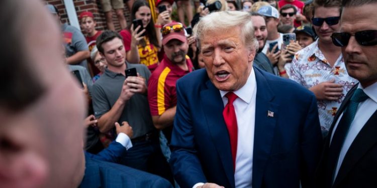 Trump keeps distance from impeachment inquiry while assailing Biden