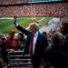 Trump and DeSantis converge again in Iowa at rivalry game, with different styles