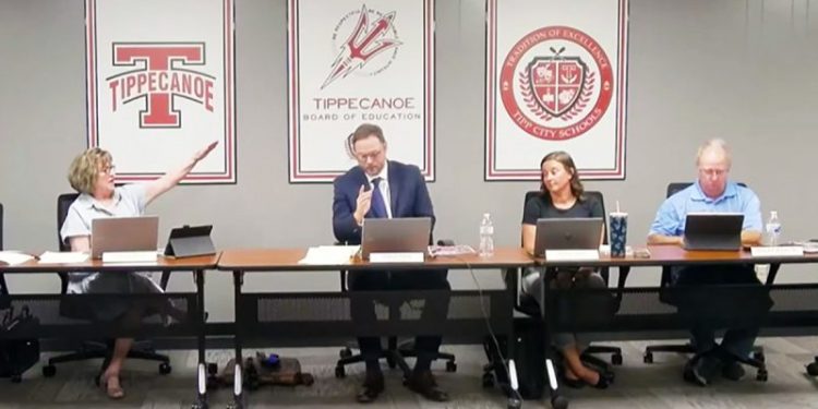 School board member does Nazi salute in clash with ‘dictator’ rival