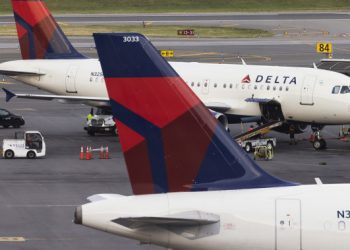 Delta says Hollywood and auto strikes are denting business travel