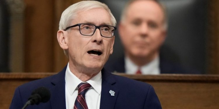 Man with a gun demands to see Wisconsin governor, is arrested, and returns with rifle