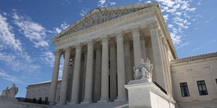 Supreme Court under pressure issues ethics code specific to justices