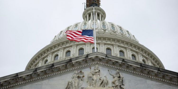 Moody’s lowers U.S. credit outlook, citing political dysfunction