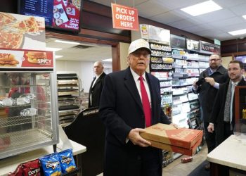 Trump-dominated Iowa race barrels to contentious finish in frigid weather