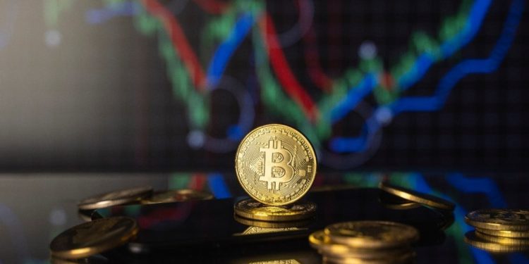 Bitcoin Hits $52K, Market Cap Tops $1 Trillion