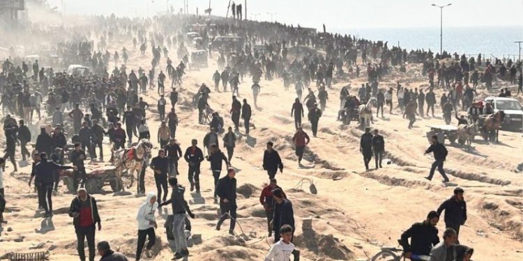 IDF says troops fired ‘warning shots’ as mob rushed aid convoy, leading to more than 100 killed