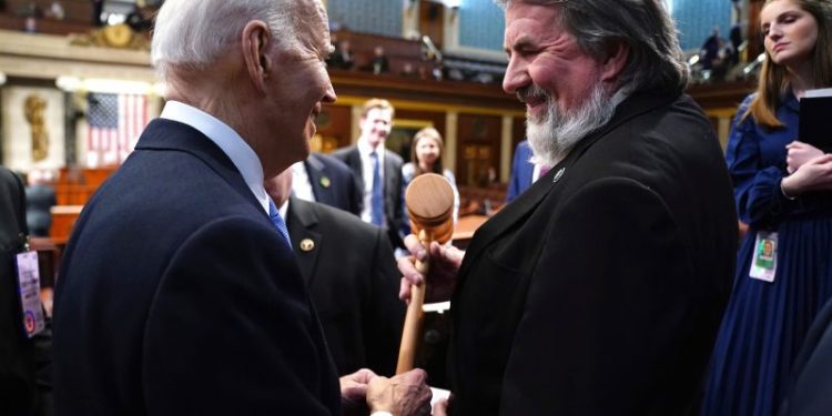 This patient Republican has Biden by the ear, one night a year