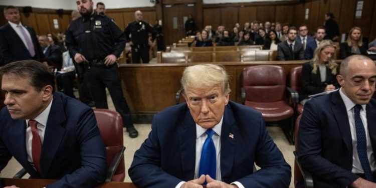 Prosecutor: A tabloid pact led to Trump faking business records